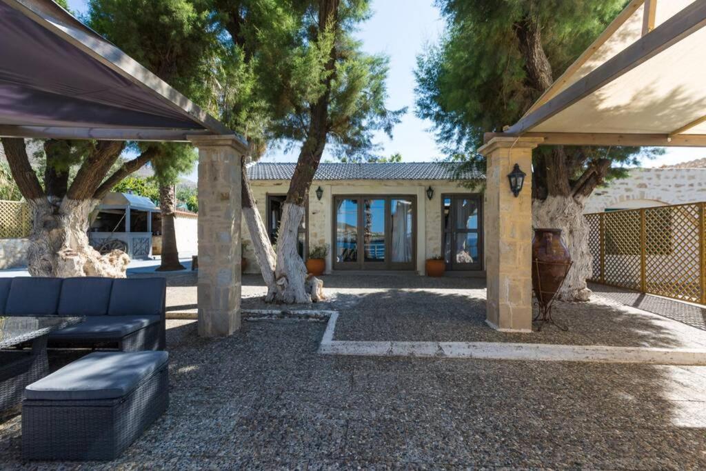 Villa Proto Helidoni - A Cozy Beachfront Villa Petres  Экстерьер фото
