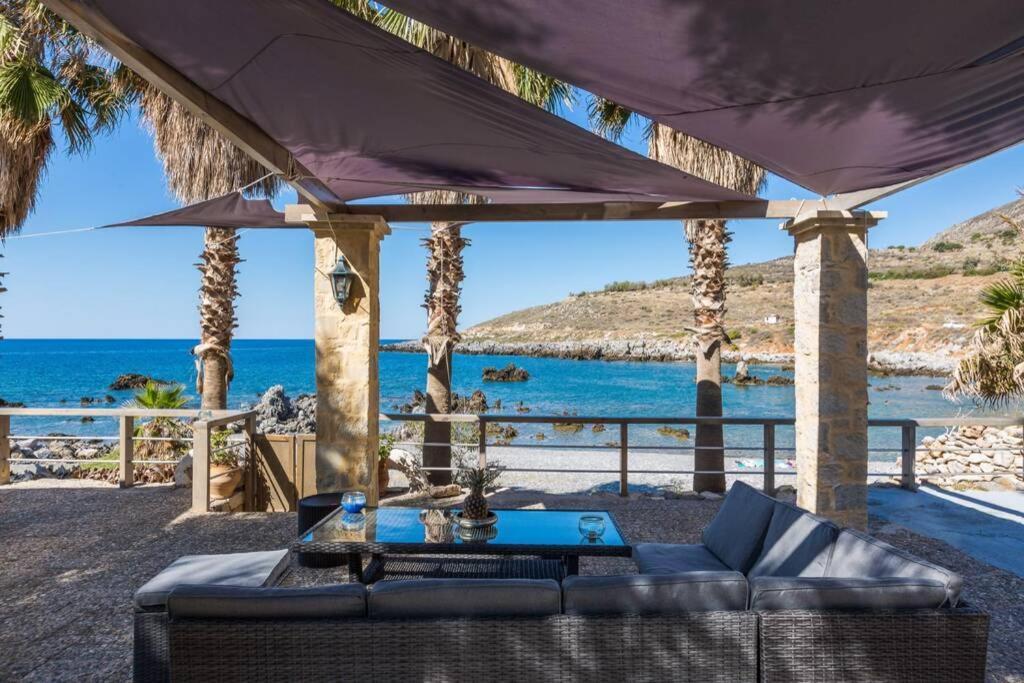Villa Proto Helidoni - A Cozy Beachfront Villa Petres  Экстерьер фото